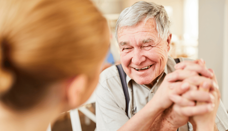 Senior smiling with woman
